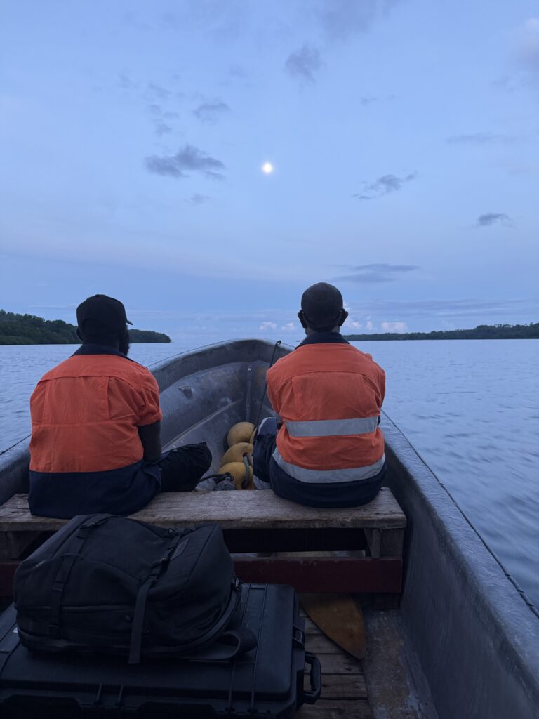 Installation team on a boat in Papua New Guinea